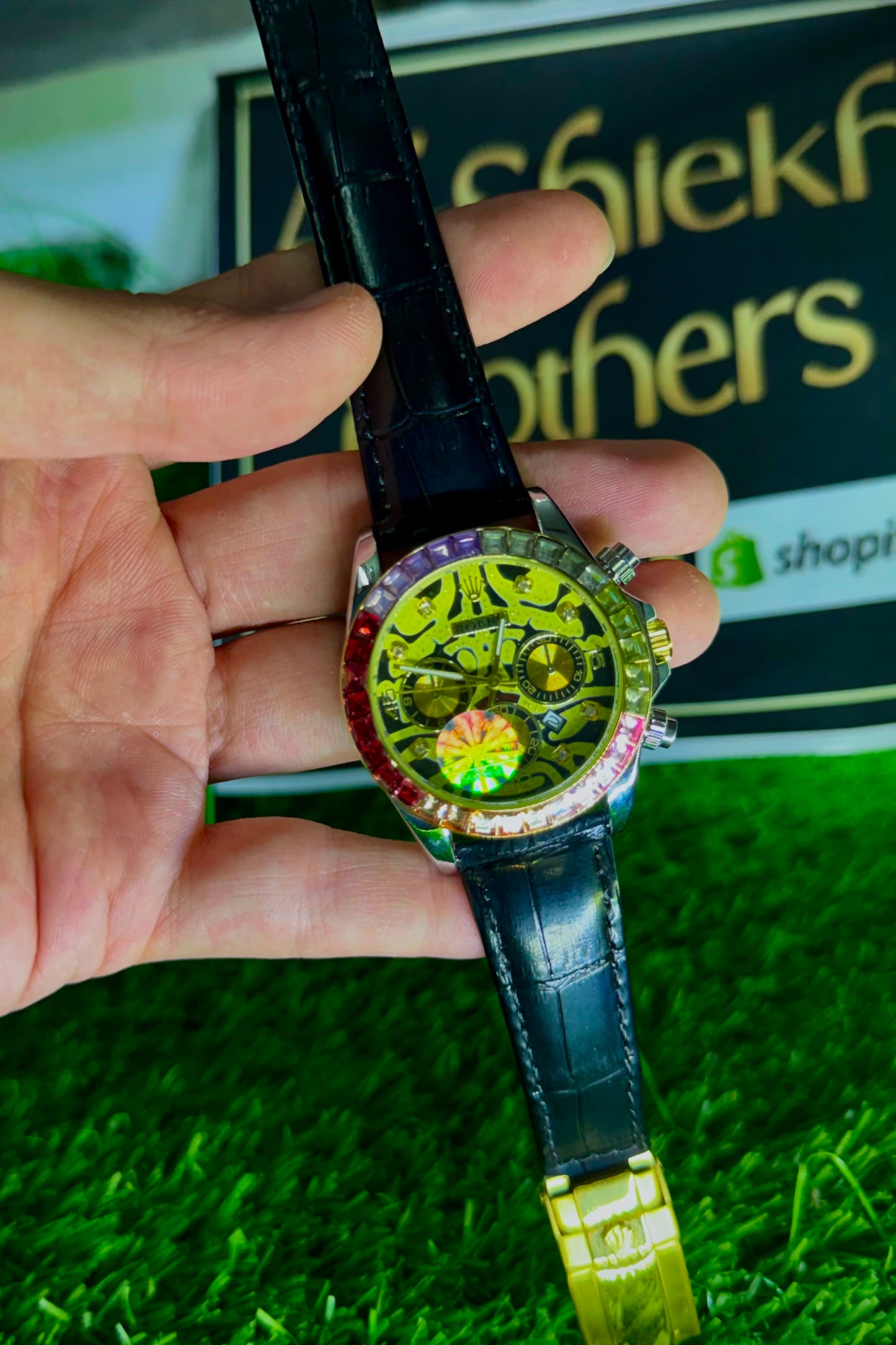 RLX Black Dial Chronograph Watch with Rainbow Bezel & Black Leather Strap